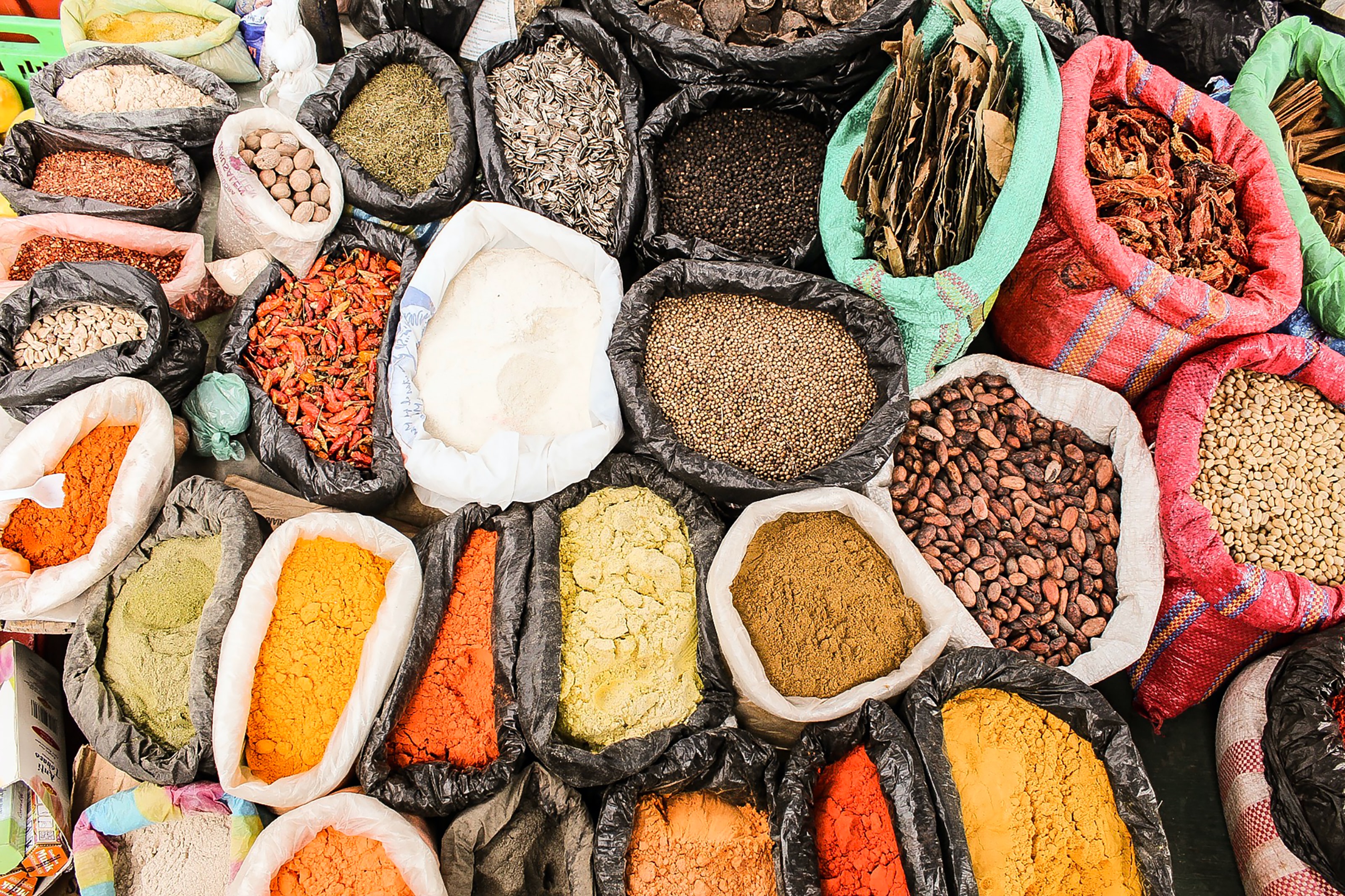 Herbs, nuts, and spices sold at a market in Otavalo, Ecuador.