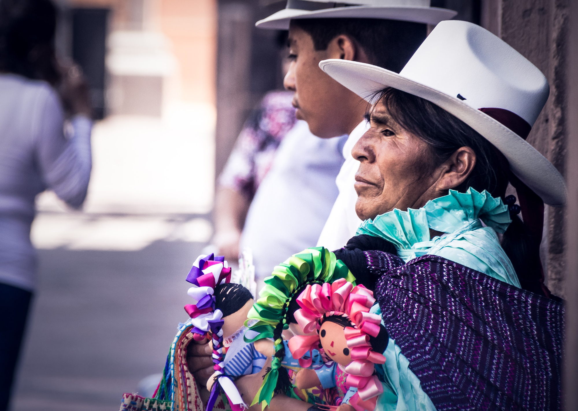 A Guatemalan woman selling items on the street.